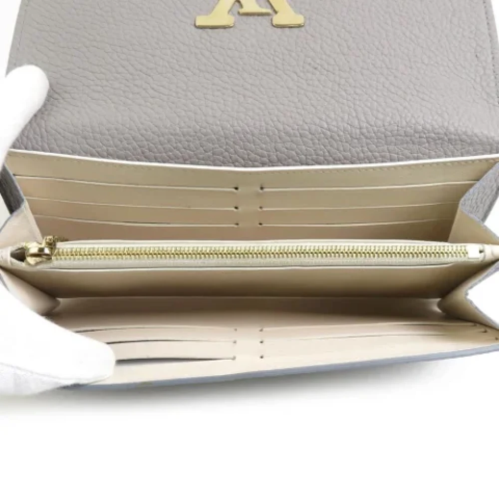Louis Vuitton Vintage Pre-owned Leather wallets Gray Dames