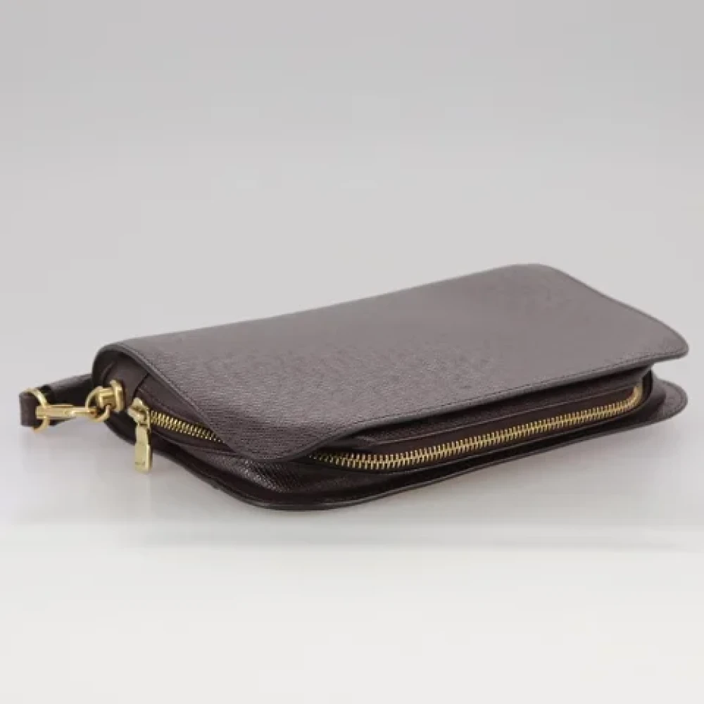 Louis Vuitton Vintage Pre-owned Leather clutches Brown Dames