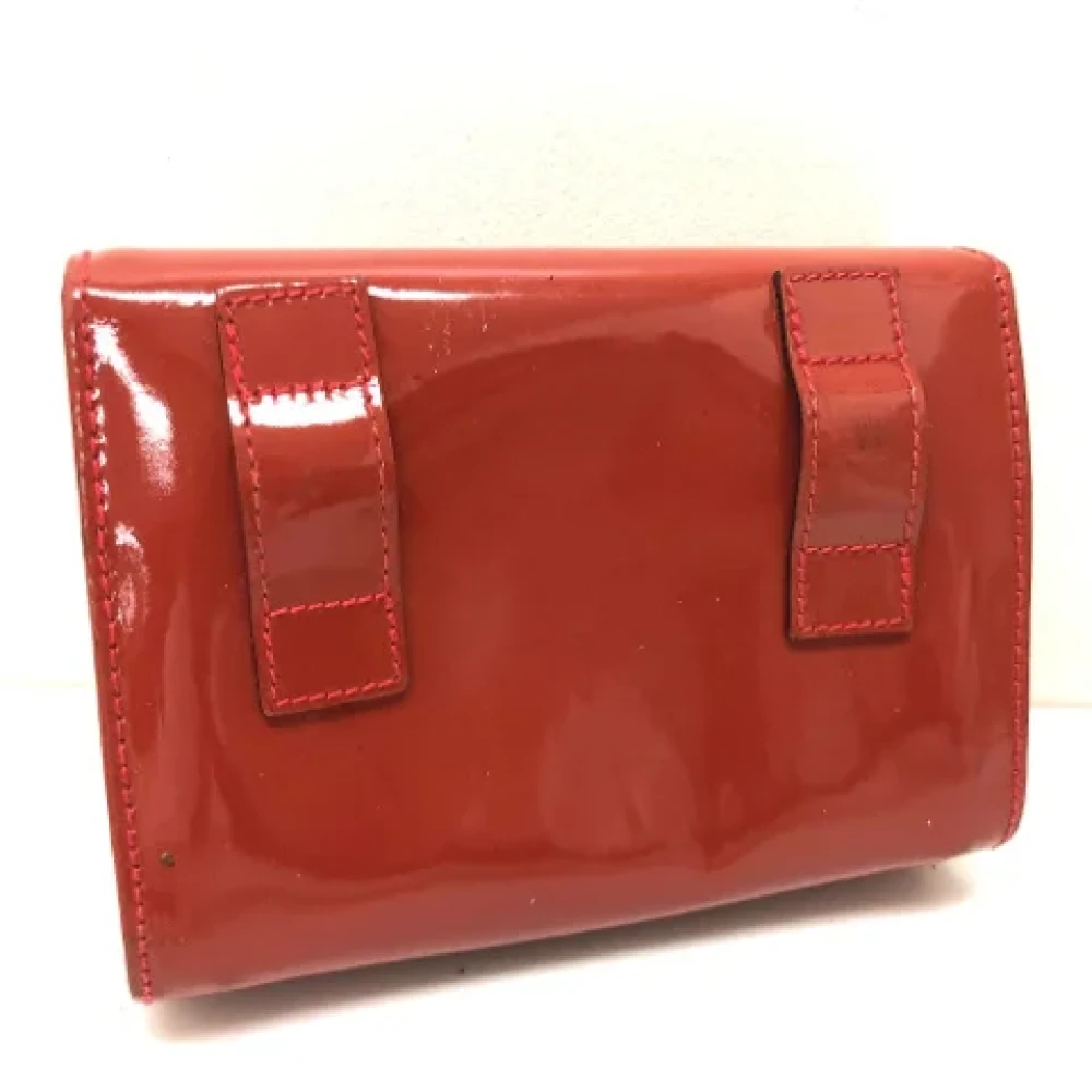 Salvatore Ferragamo Pre-owned Leather pouches Orange Dames