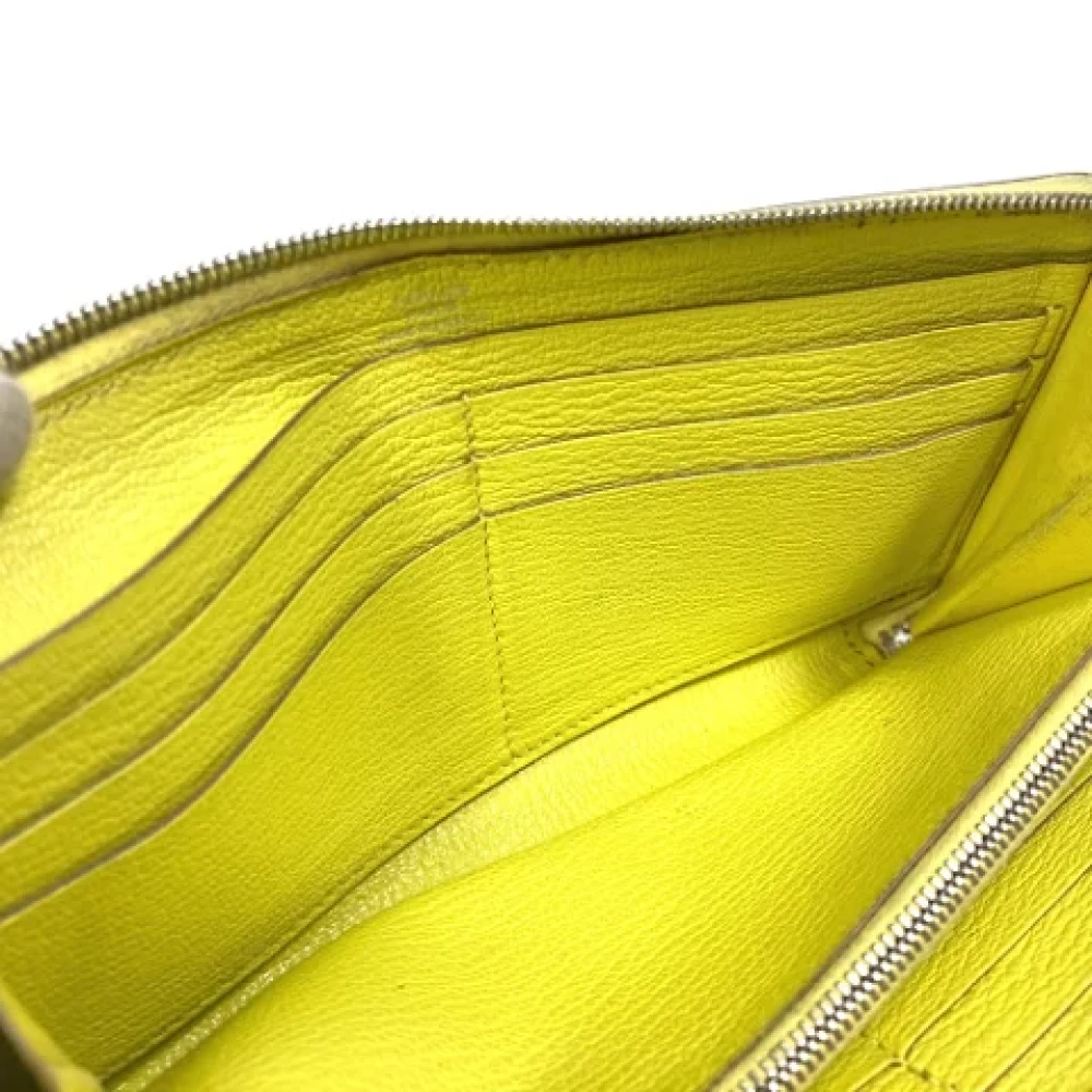 Hermès Vintage Pre-owned Leather wallets Yellow Dames