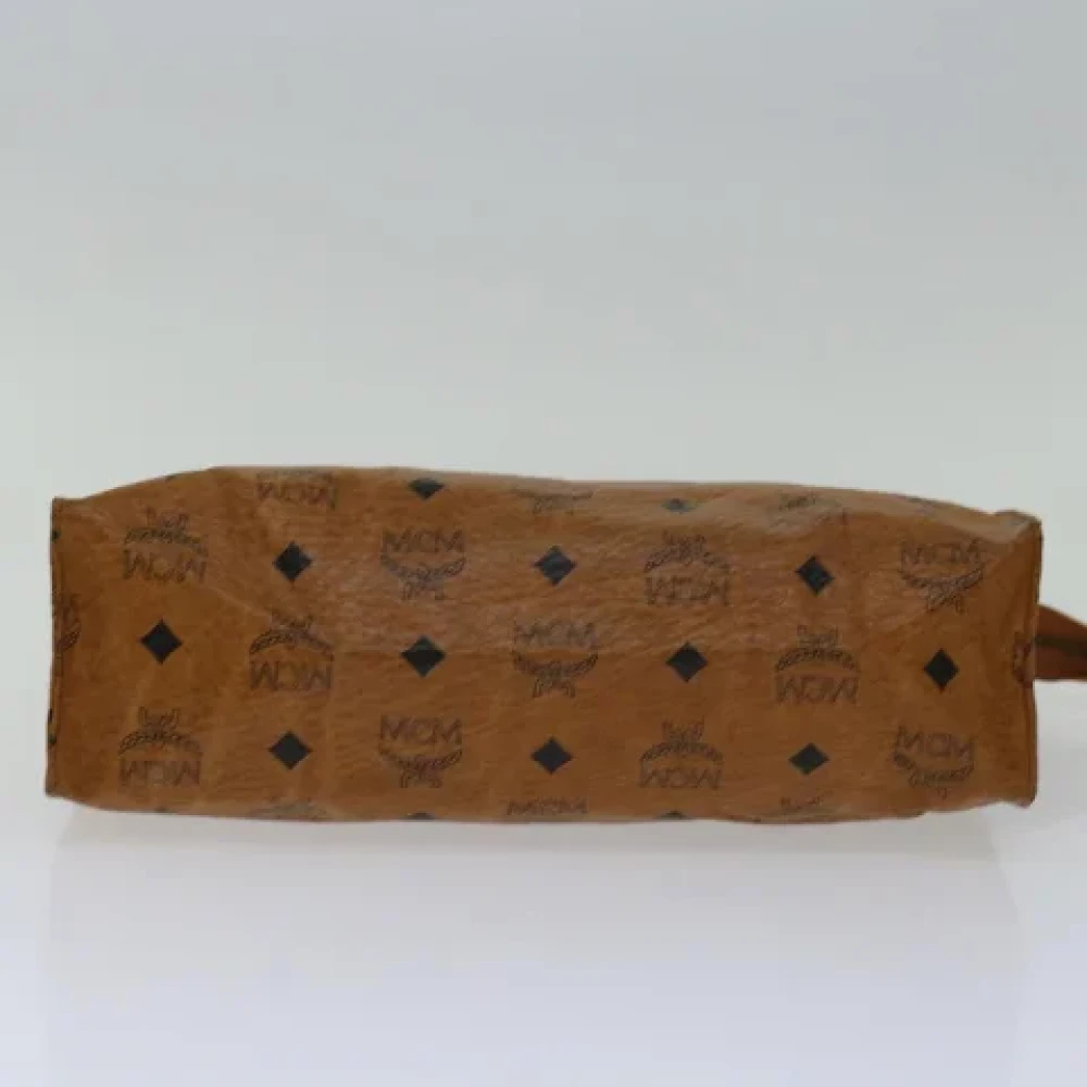 MCM Pre-owned Leather clutches Brown Dames