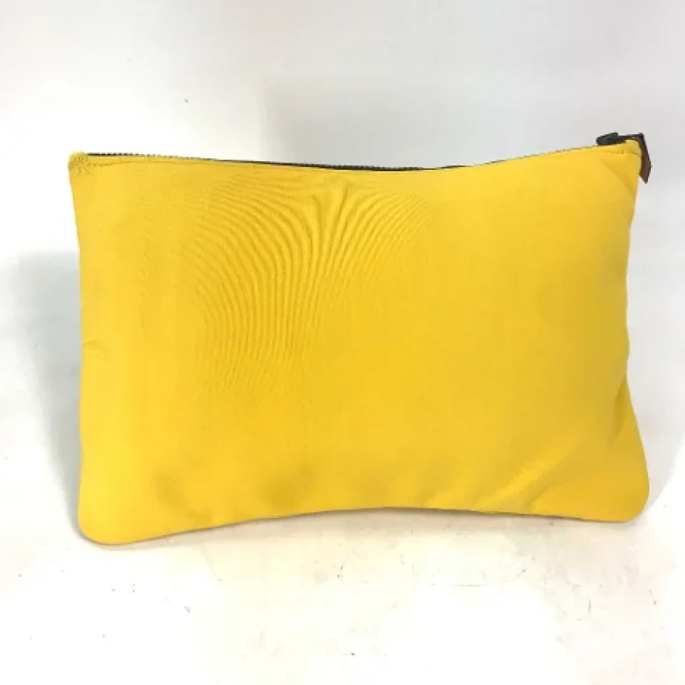 Hermès Vintage Pre-owned Fabric clutches Yellow Dames