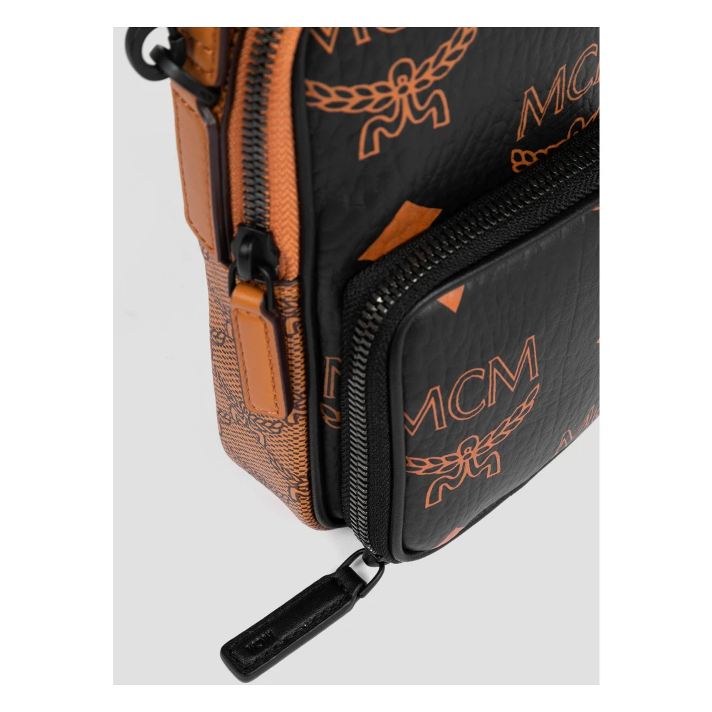 MCM Aren smartphonehoes met schouderband in monogrammix. Black Dames