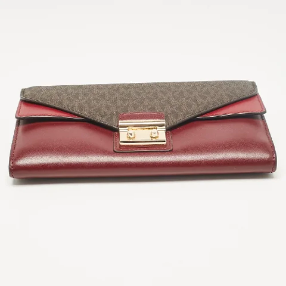 Michael Kors Pre-owned Canvas clutches Red Dames