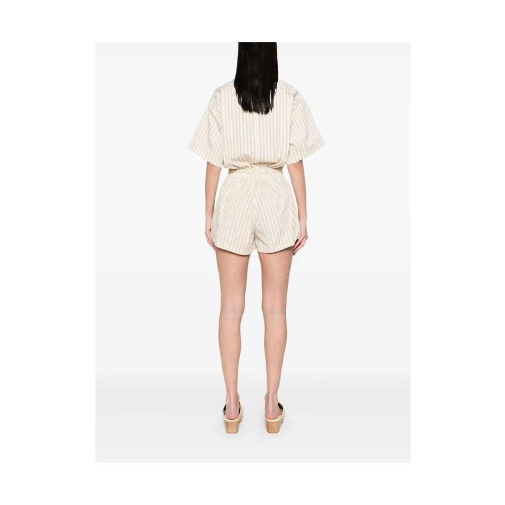 Faithfull the Brand Beige Jumpsuit met Knopen Beige Dames