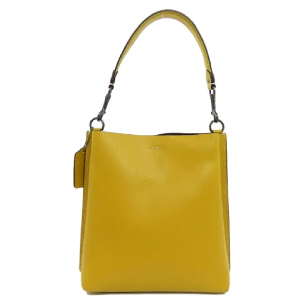 Coach Pre-owned Leather handbags Yellow Dames