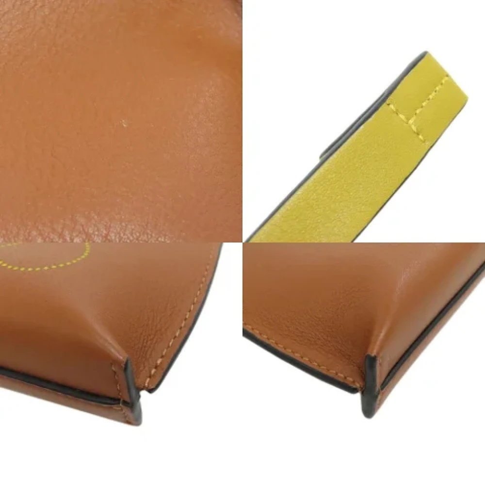 Loewe Pre-owned Leather pouches Brown Dames