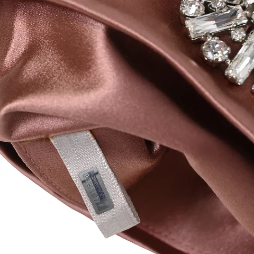 Jimmy Choo Pre-owned Fabric clutches Pink Dames