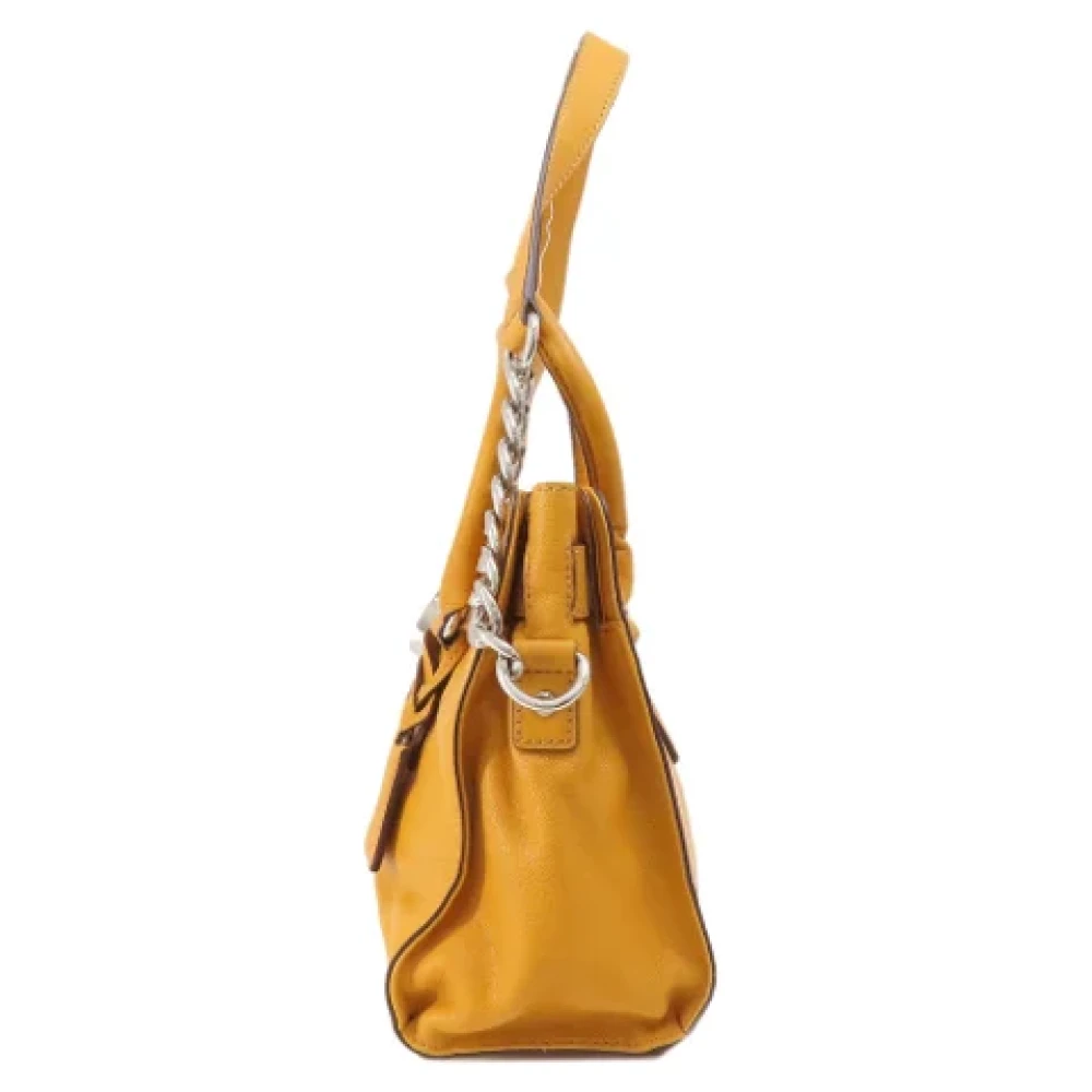 Michael Kors Pre-owned Fabric handbags Yellow Dames