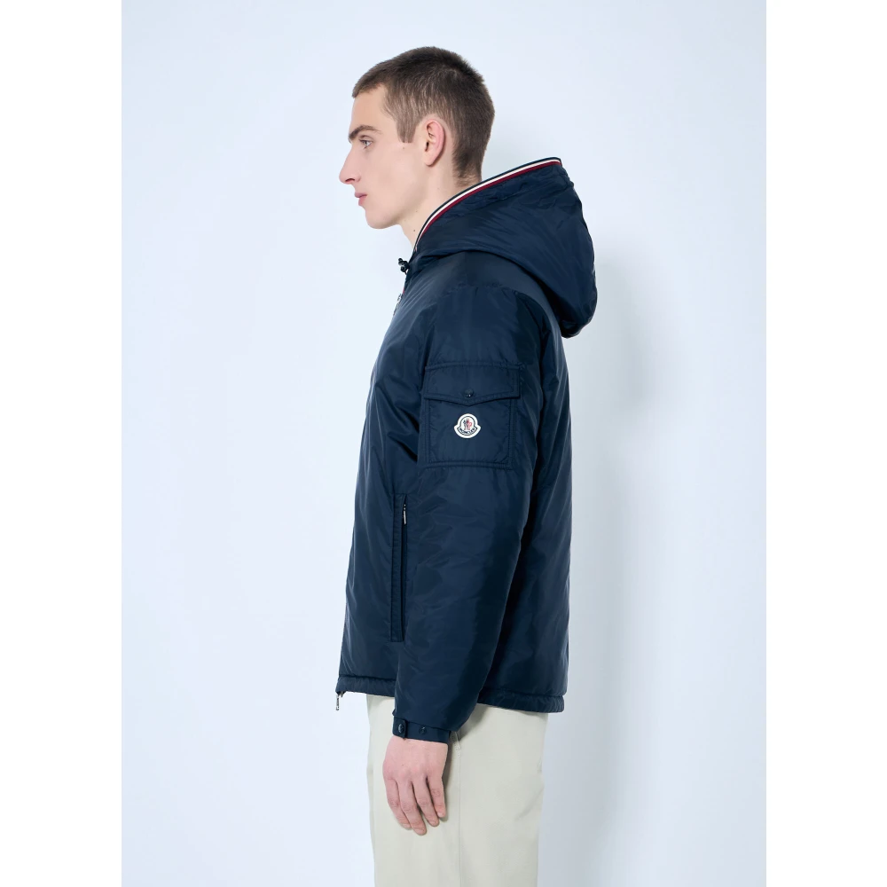 Moncler Waterafstotende gewatteerde jas met capuchon en afwerking Blue Heren