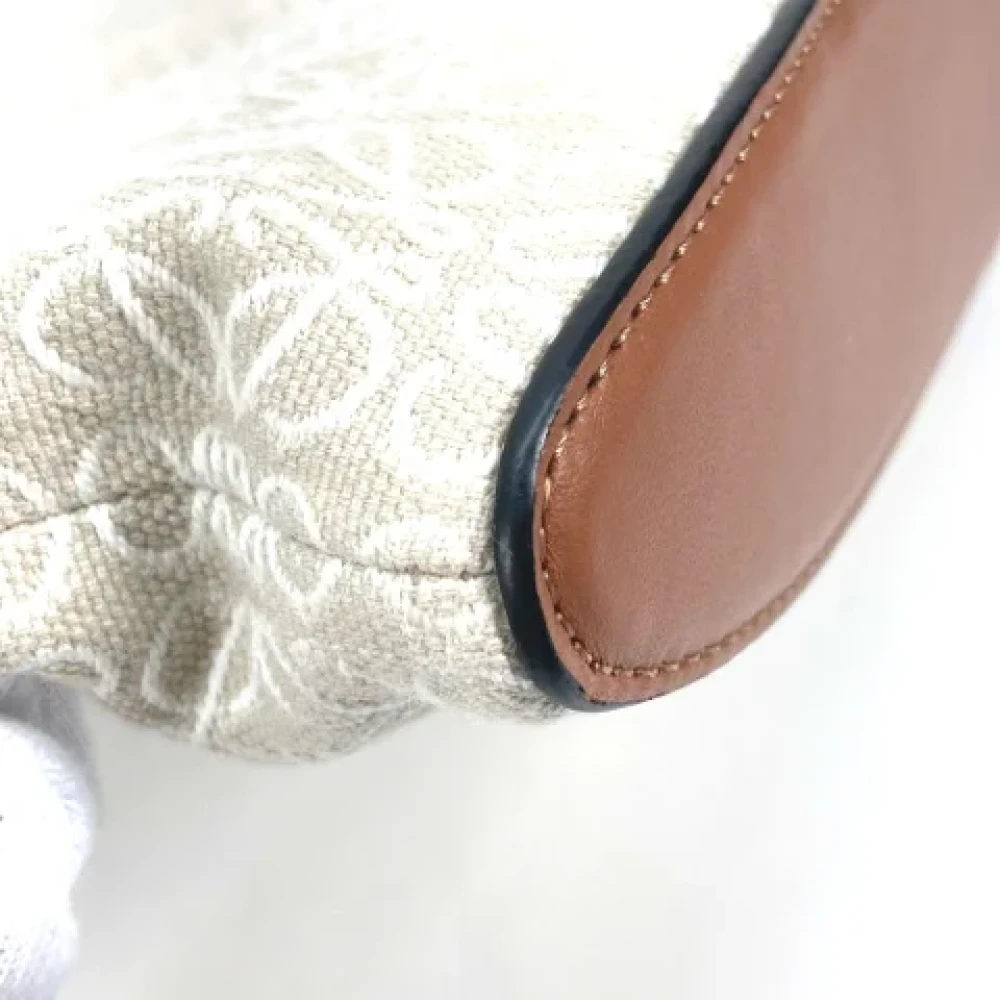 Loewe Pre-owned Fabric clutches Beige Heren