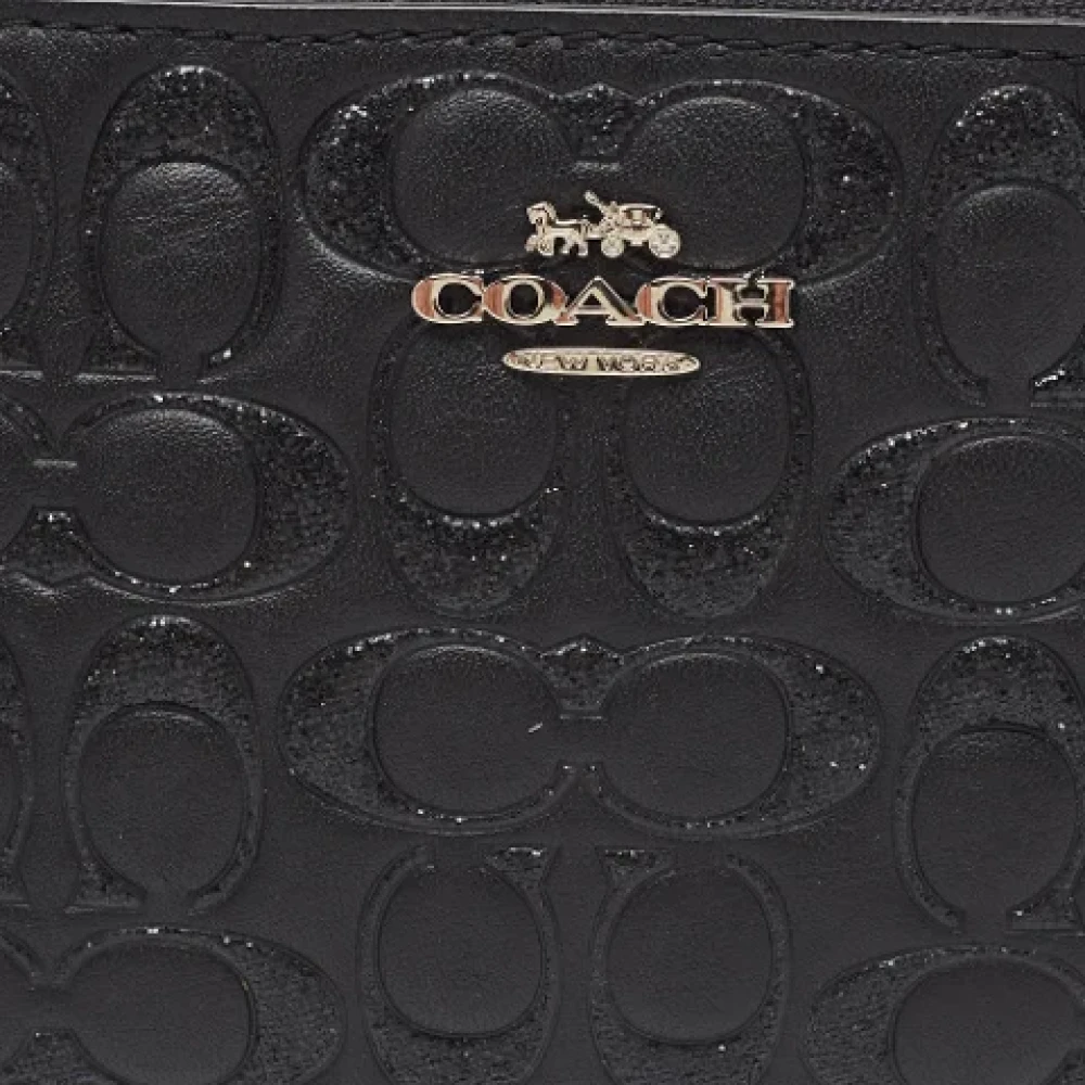Coach Pre-owned Leather clutches Black Dames