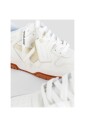white-leather-sneakers-with-orange-sole