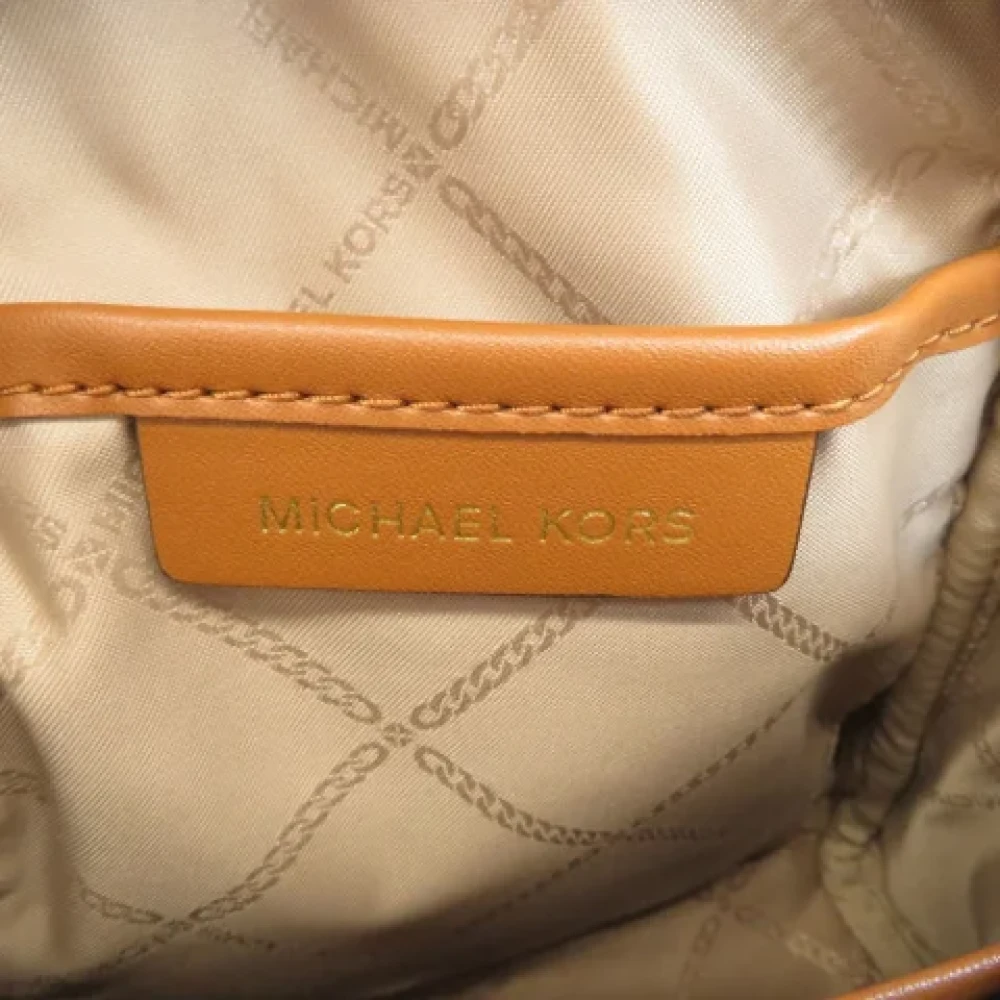Michael Kors Pre-owned Plastic backpacks Brown Dames