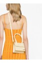 witte-leren-tas-met-gouden-logo