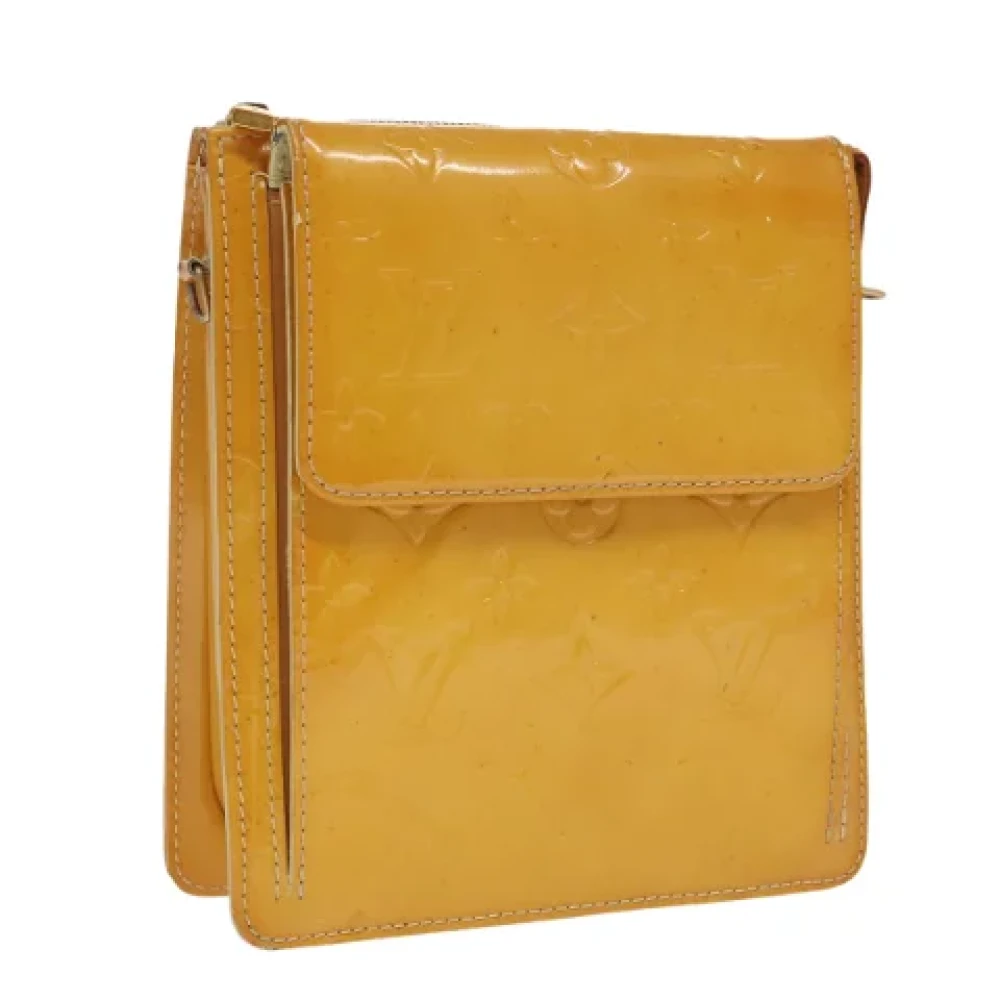 Louis Vuitton Vintage Pre-owned Leather clutches Yellow Dames