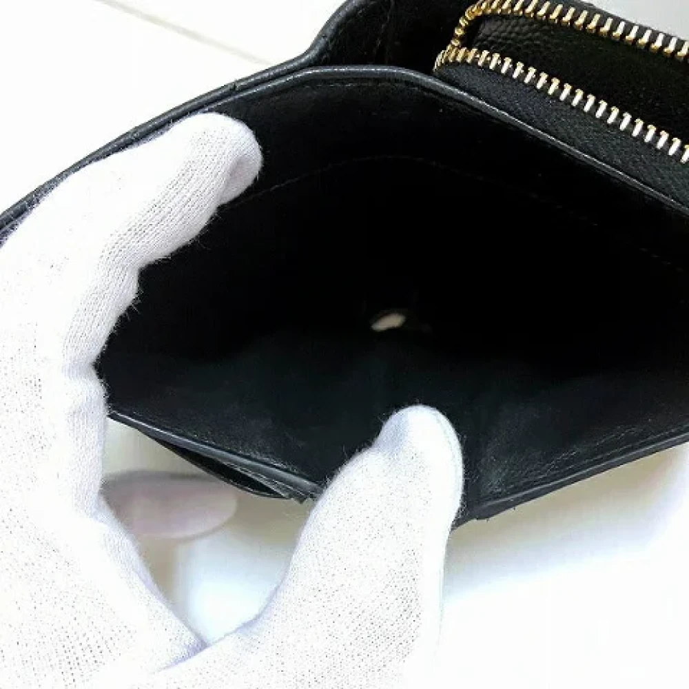 Yves Saint Laurent Vintage Pre-owned Leather wallets Black Dames