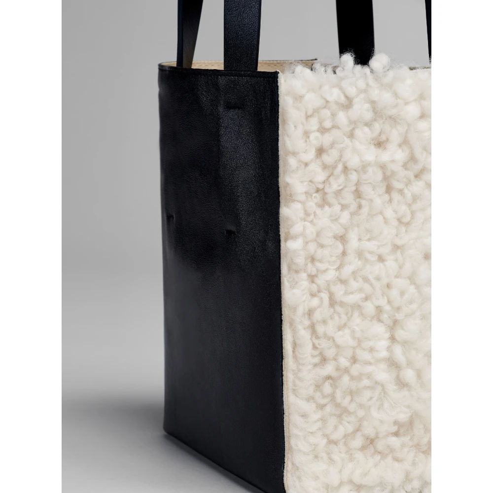 Marni Zachte lamsvacht handtas met logo White Dames