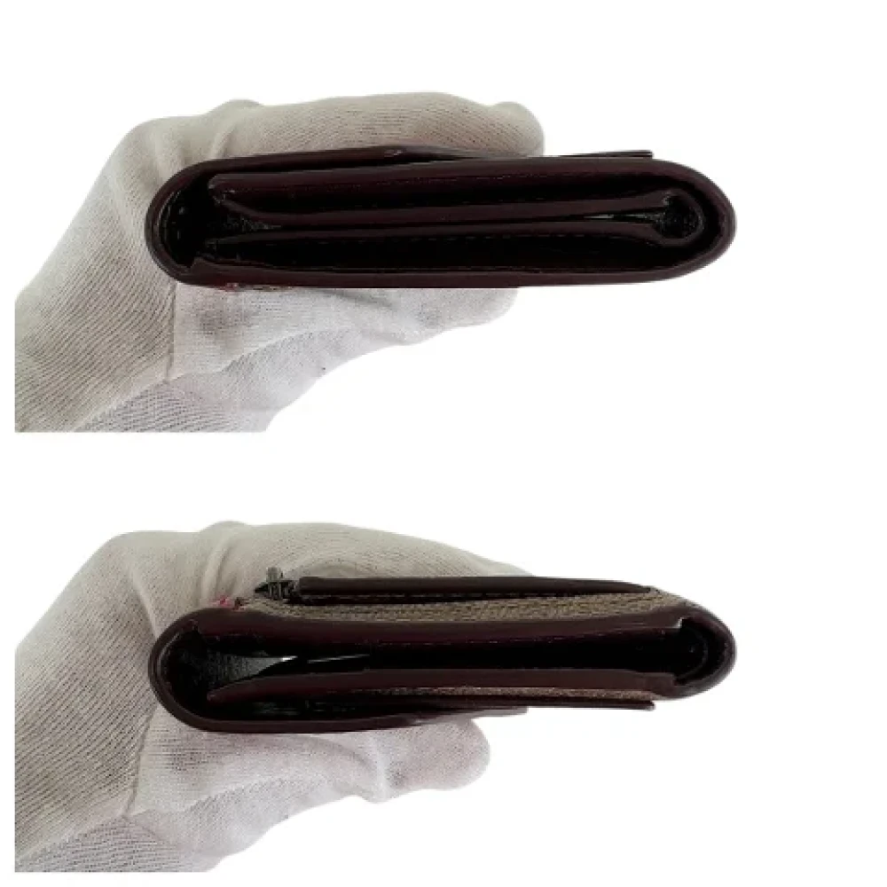 Coach Pre-owned Plastic wallets Red Dames