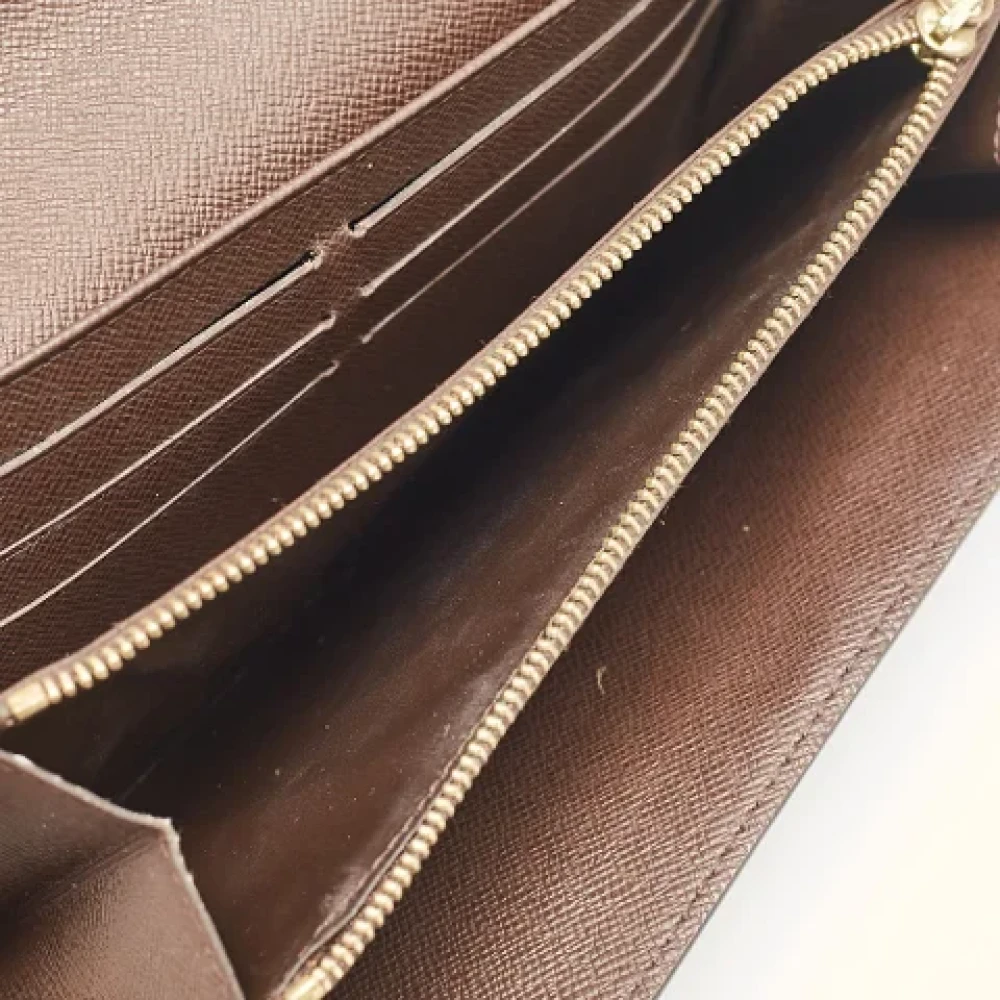 Louis Vuitton Vintage Pre-owned Coated canvas wallets Brown Dames