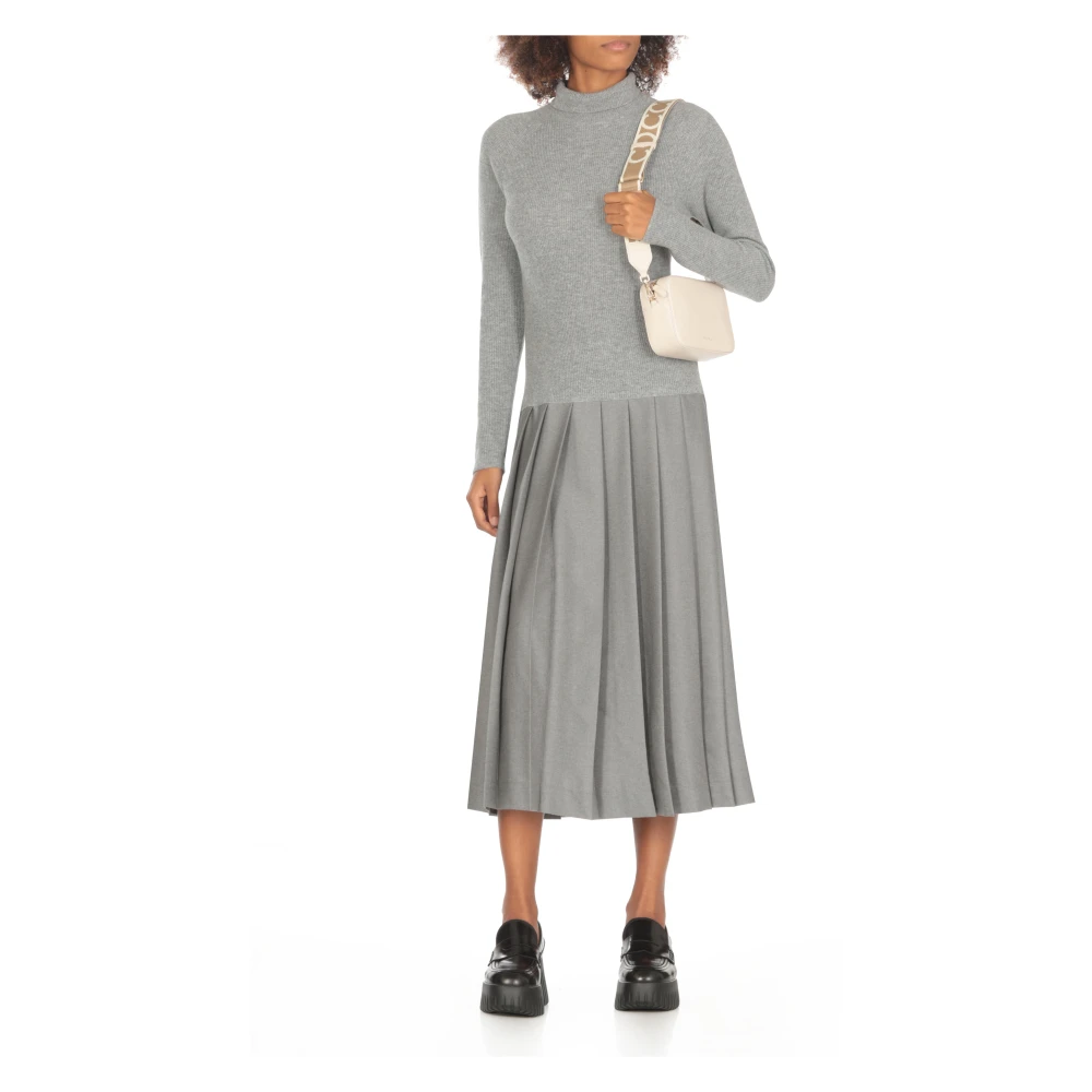 Coccinelle Ivoor Leren Schoudertas met Afneembare Band Beige Dames
