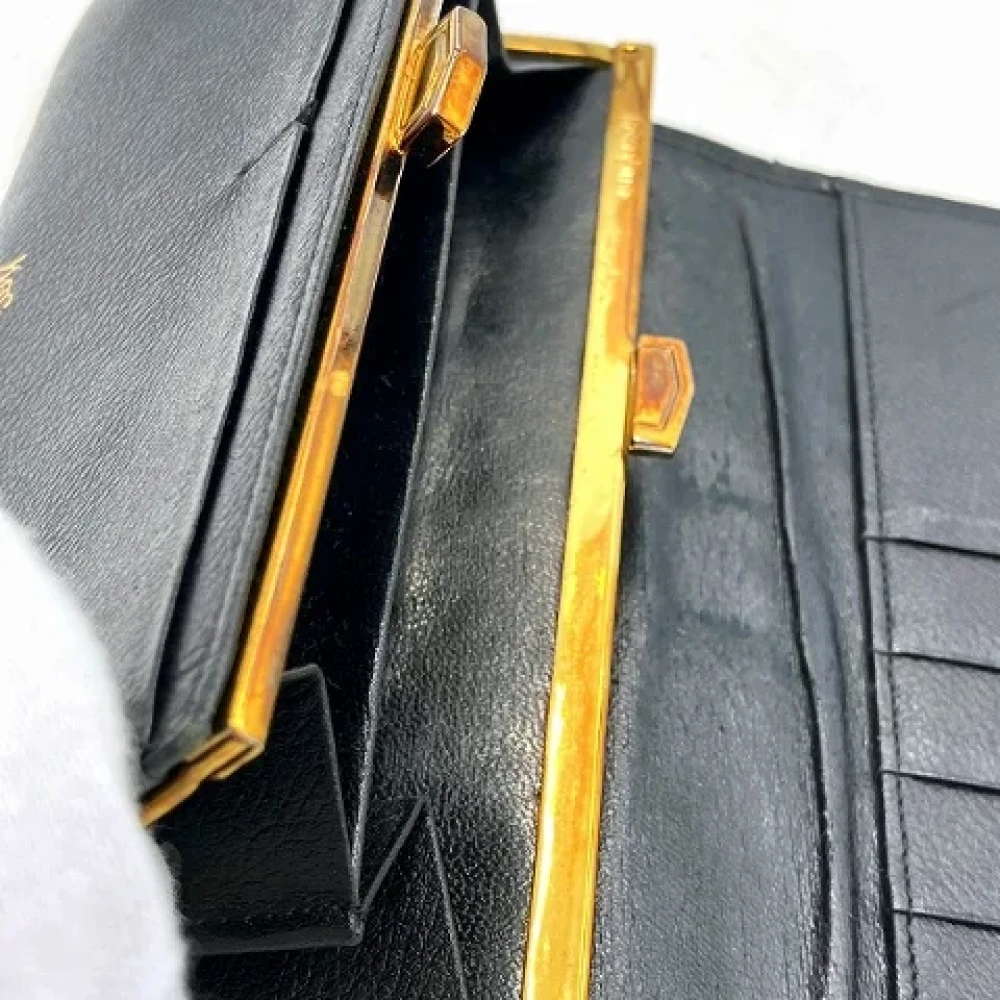 Yves Saint Laurent Vintage Pre-owned Leather wallets Black Dames