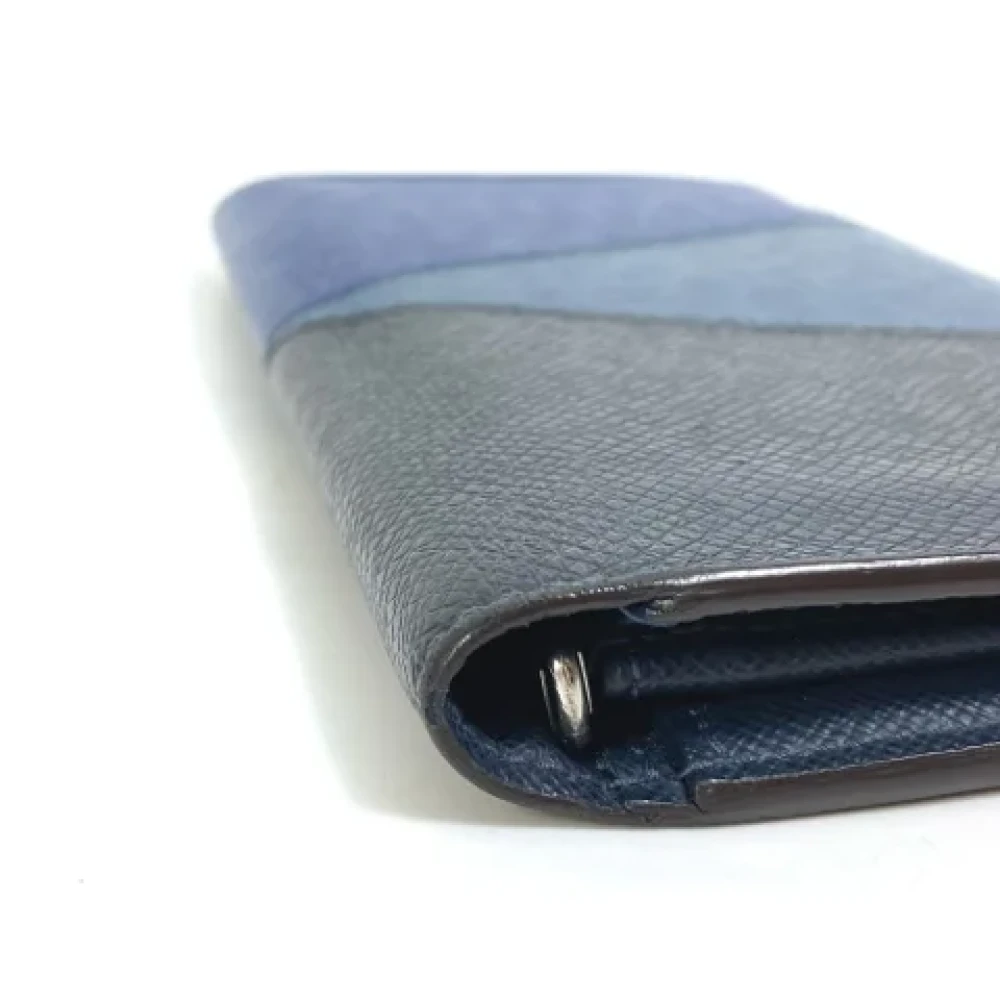 Louis Vuitton Vintage Pre-owned Leather wallets Blue Heren
