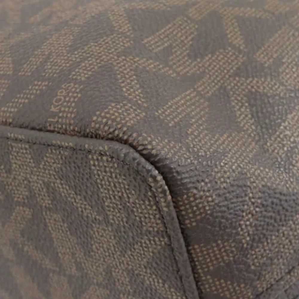 Michael Kors Pre-owned Plastic totes Brown Dames