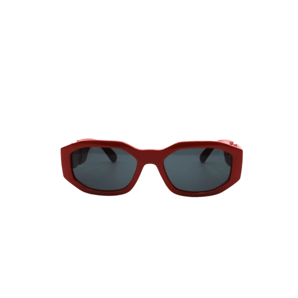 Hexagonal solbriller med rød ramme og grå linser