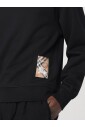 zwarte-crewneck-sweatshirt