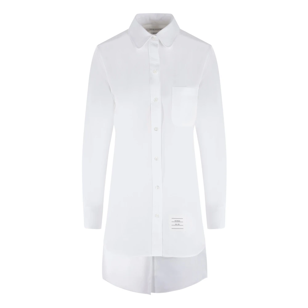 Hvit oversized bomull poplin skjorte med dype sidespor og bakre kutt