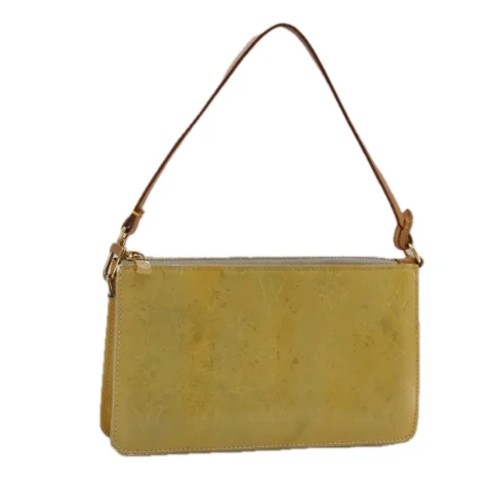Louis Vuitton Vintage Pre-owned Leather pouches Beige Dames