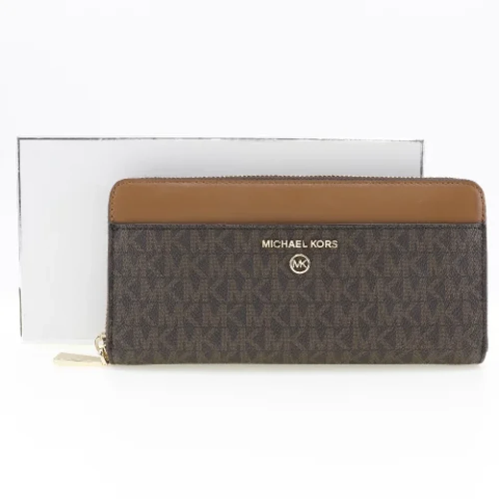 Michael Kors Pre-owned Leather wallets Brown Dames