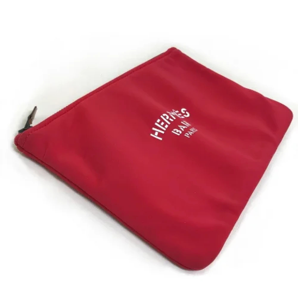 Hermès Vintage Pre-owned Fabric clutches Red Dames