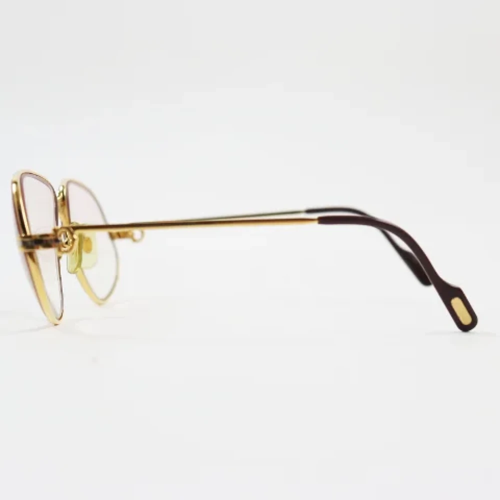 Cartier Vintage Pre-owned Metal sunglasses Yellow Heren