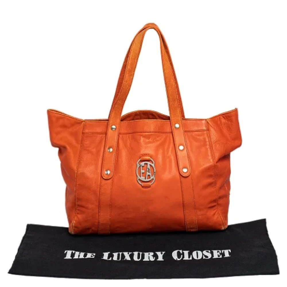 Armani Pre-owned Leather totes Orange Dames