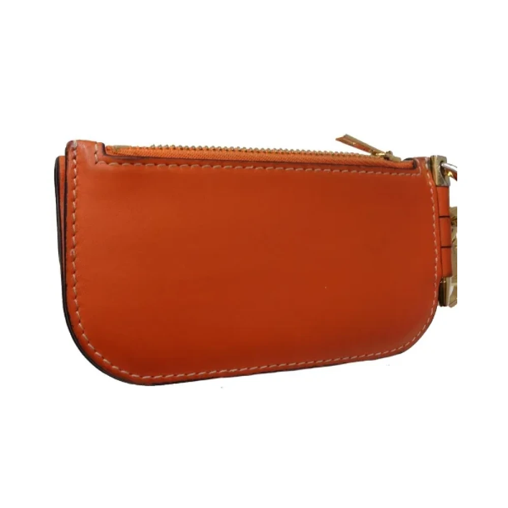 Loewe Pre-owned Leather wallets Orange Unisex