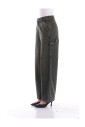 groene-jeans-met-rits-en-knoop
