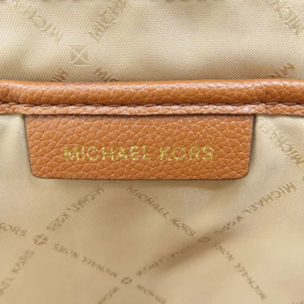 Michael Kors Pre-owned Plastic backpacks Brown Dames
