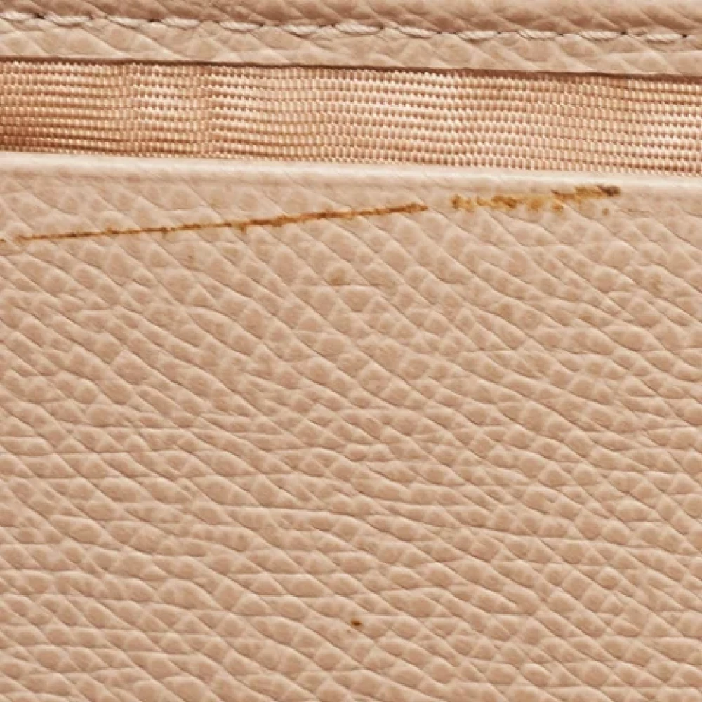 Salvatore Ferragamo Pre-owned Leather wallets Beige Unisex