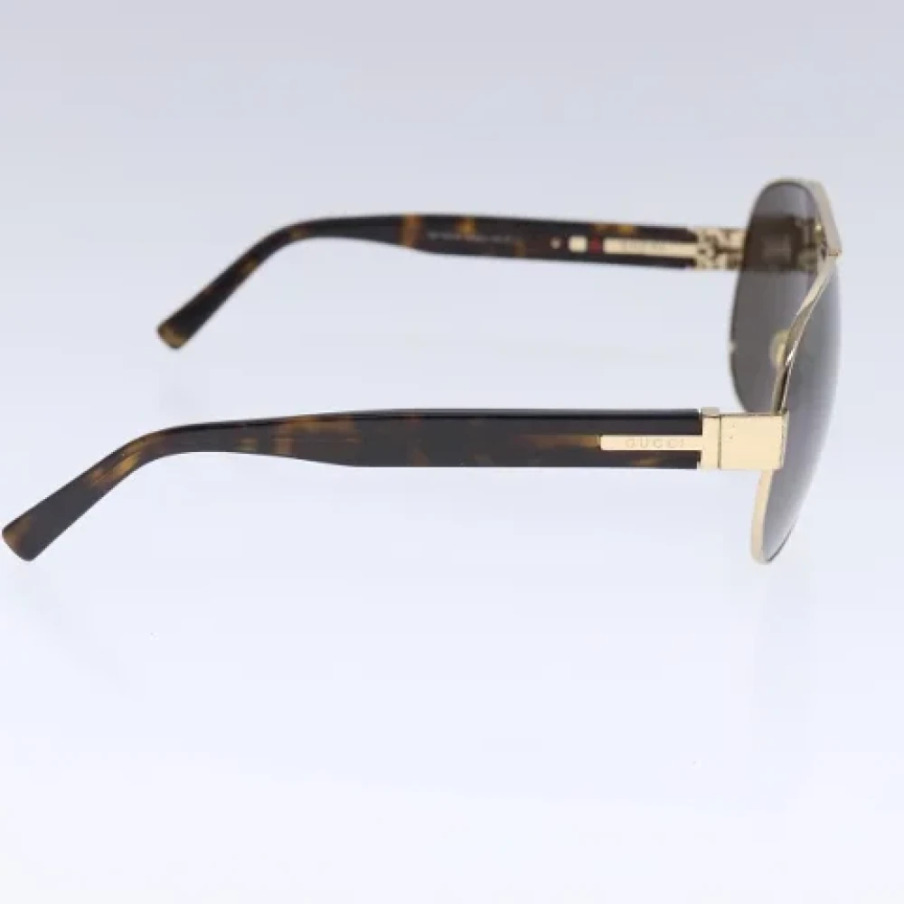 Gucci Vintage Pre-owned Metal sunglasses Brown Heren
