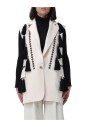 gilet-blanc-en-laine-avec-pompons