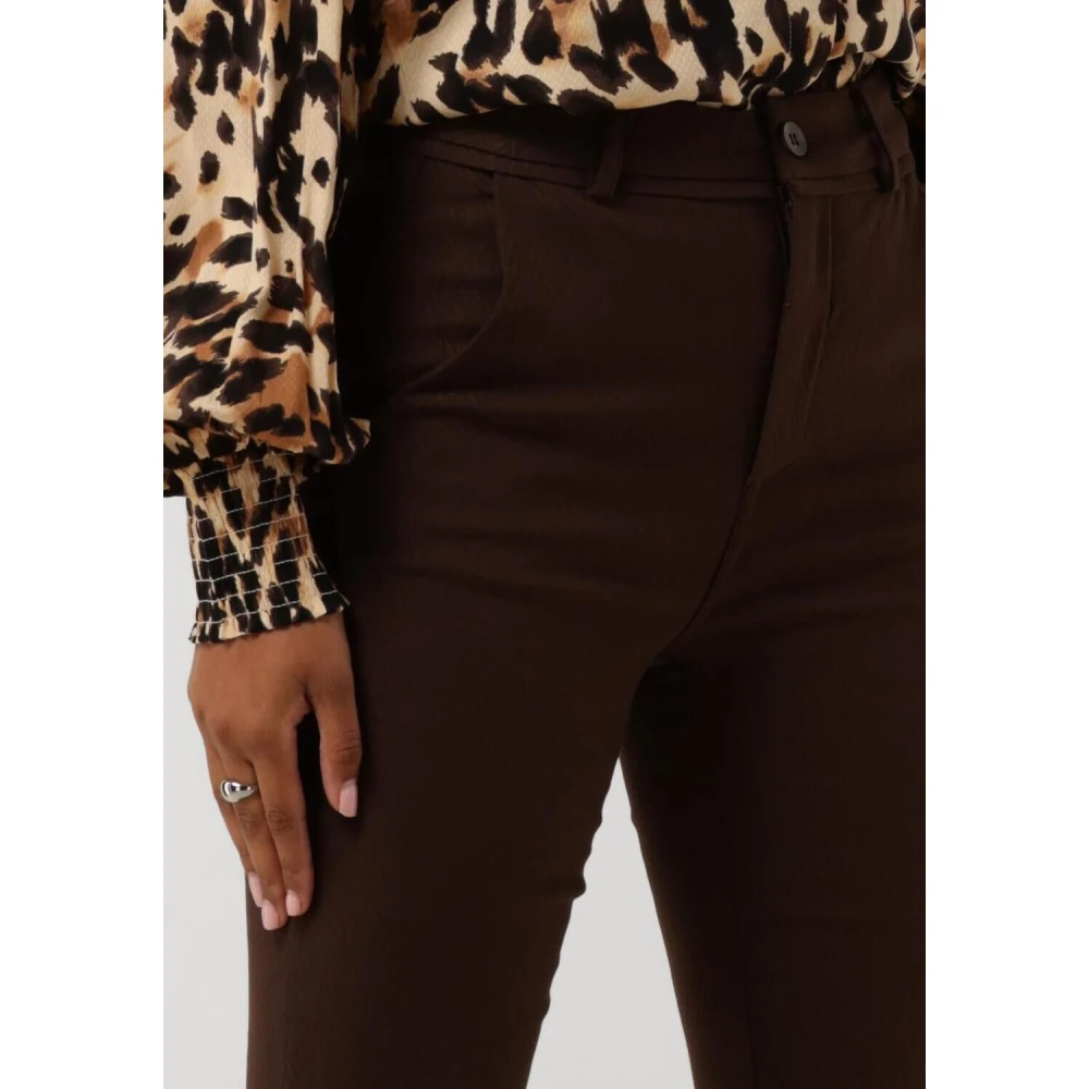 Minus Flared Graphic Pants Brown Dames
