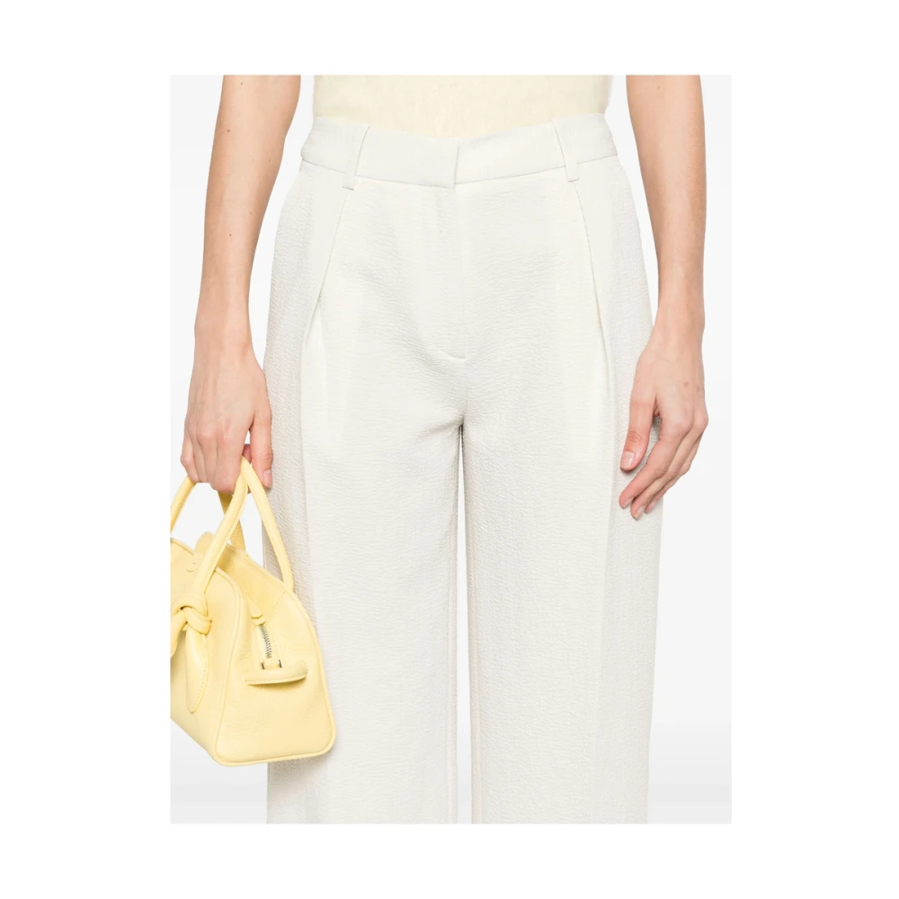 Calvin Klein Witte broek met knoopsluiting en zakken White Dames