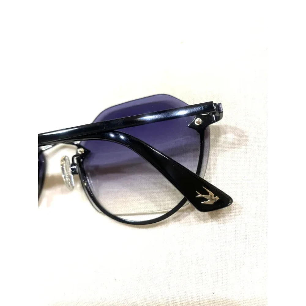 Alexander McQueen Pre-owned Metal sunglasses Black Dames