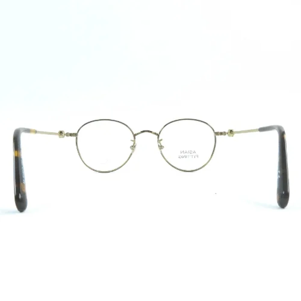 Moncler Pre-owned Metal sunglasses Brown Dames