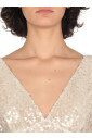 top-sans-manches-a-sequins-ivoire-et-col-en-v