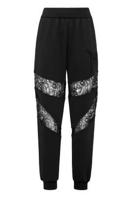 Joggingbyxor i bomullsfleece med spetsdetaljer