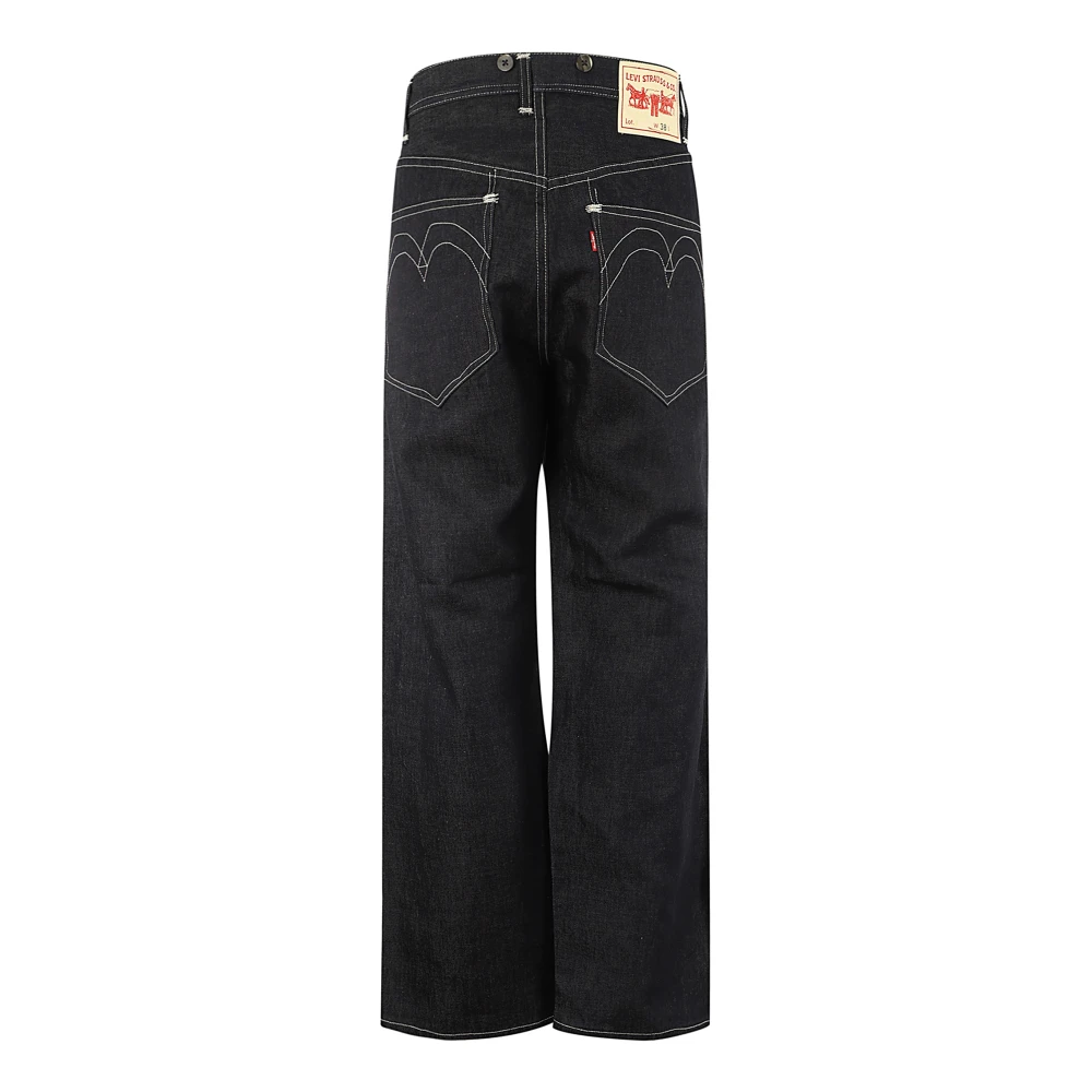 Junya Watanabe Blauwe Jeans met Knoopdetail en Grote Zakken Blue Heren