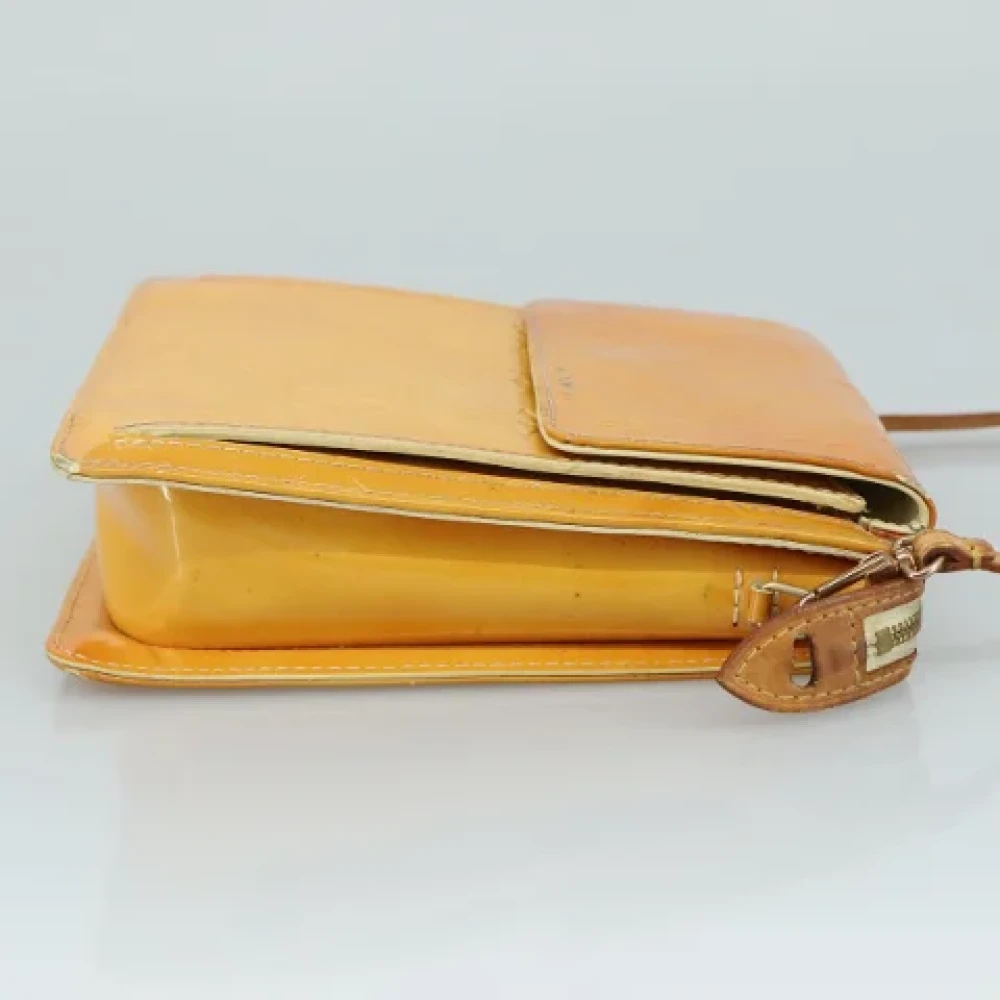 Louis Vuitton Vintage Pre-owned Leather pouches Yellow Dames